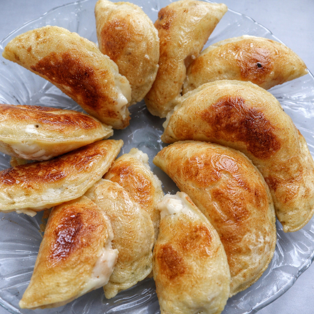 Qatayef fourrés à la crème ou aux noix
