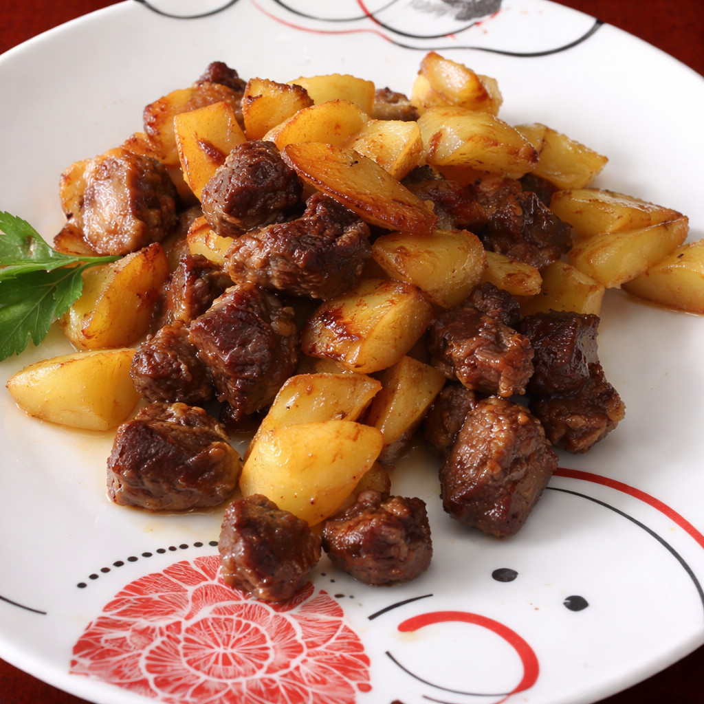 Potato Cubes with Sausages and Eggplant
